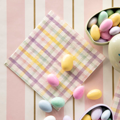A Spring Plaid Cocktail Napkin with colorful Easter candies.
