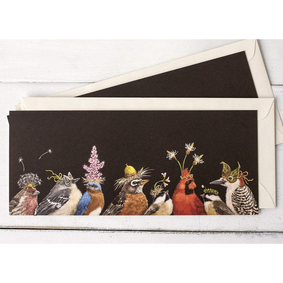 A row of colorful birds with leaves on their heads, featuring Hester &amp; Cook&