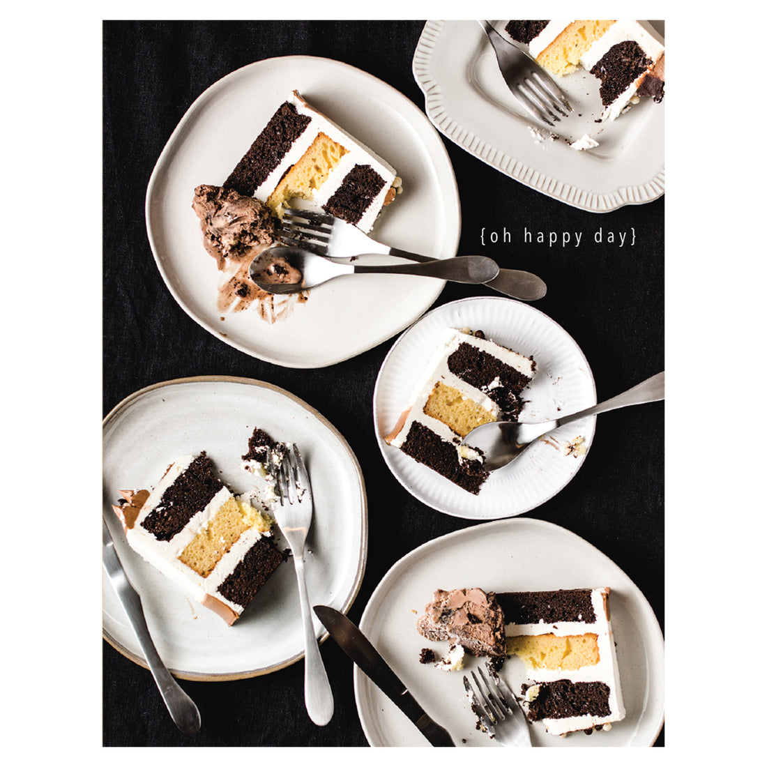 A top-down photo of several white plates with partially eaten slices of layered cake on a black background, with &quot;{oh happy day}&quot; printed in white between plates. 