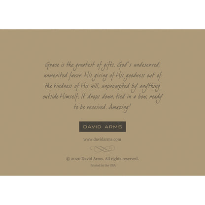 The tan back side of the greeting card, featuring a quote from artist David Arms. 