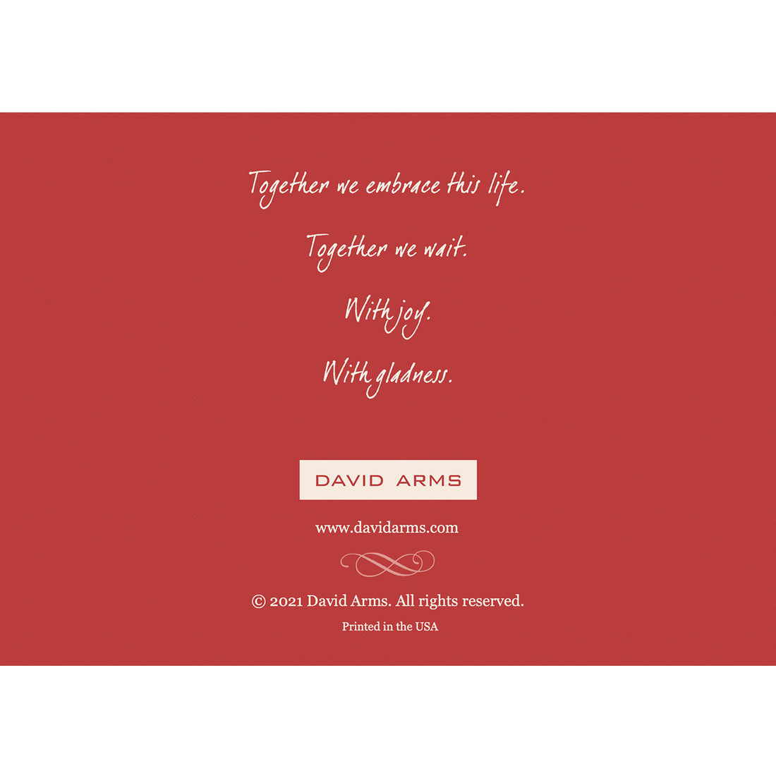 The red back side of the greeting card, featuring a quote from artist David Arms.