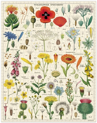 A Cavallini Papers &amp; Co cylindrical container with a Wildflowers Puzzle design, containing 1000 pieces.