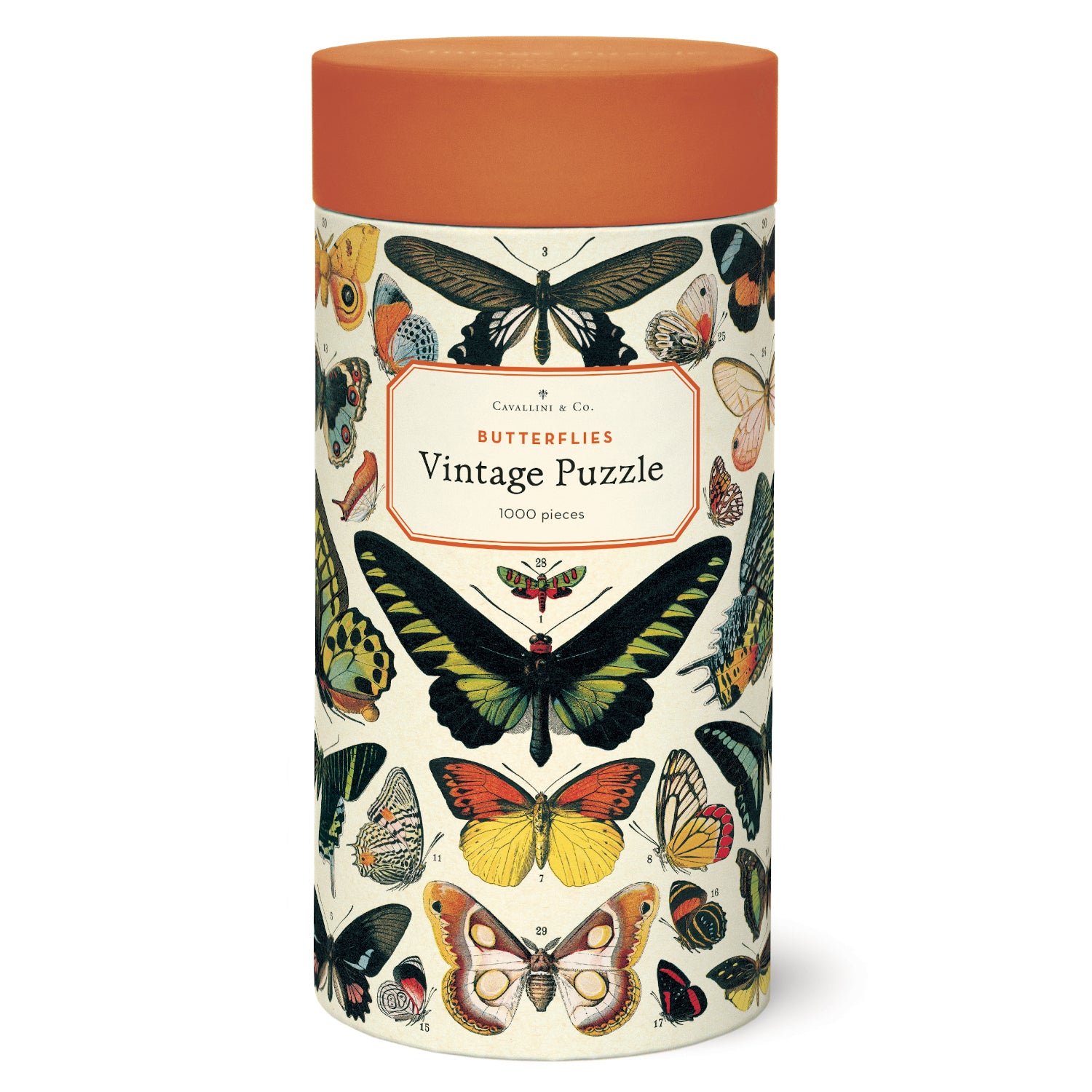 A tin of vintage puzzles with a Cavallini Papers & Co 1000 piece Butterflies Puzzle on it.