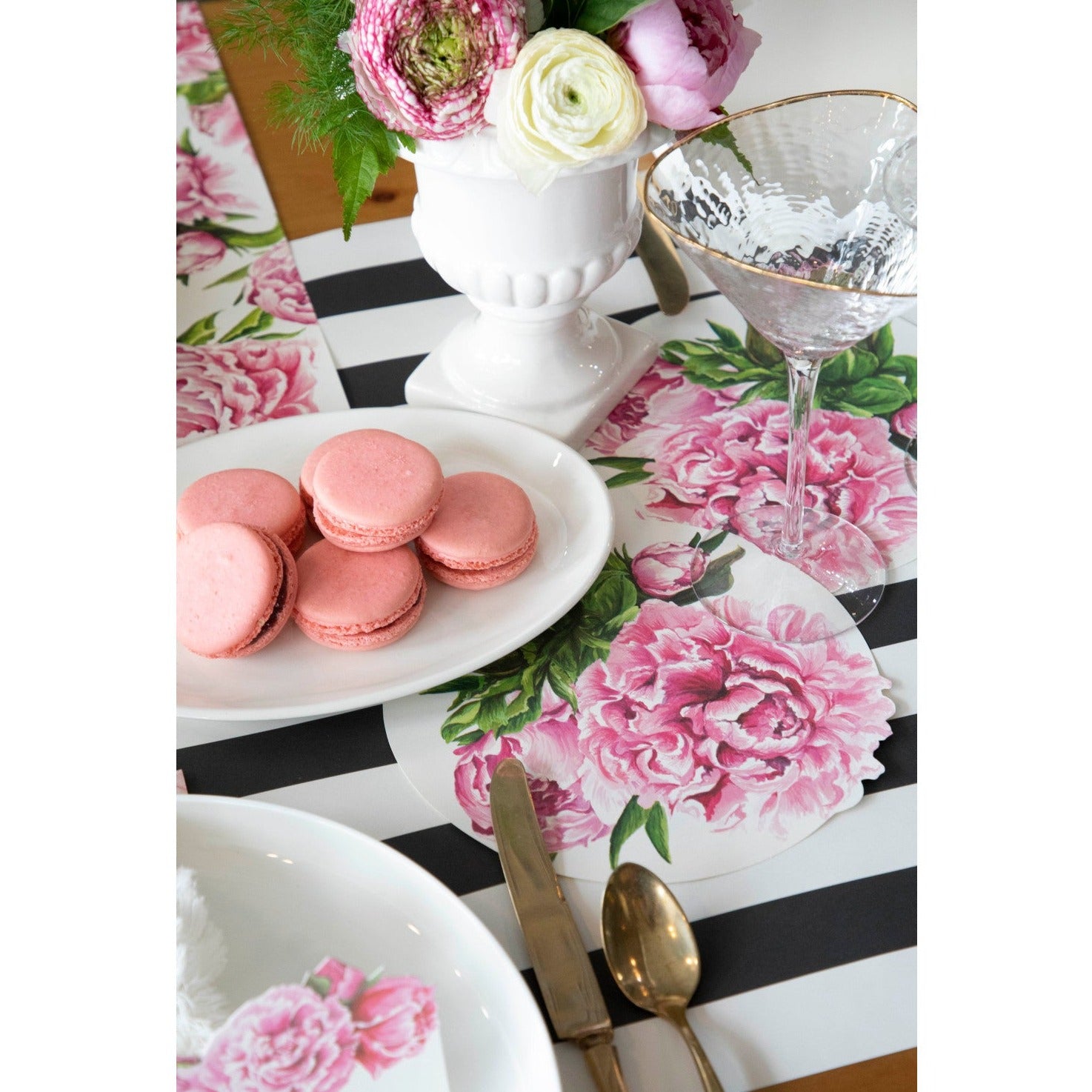 An elegant, floral treat spread featuring Peony Serving Papers under various cookies and treats, and a flower vase.