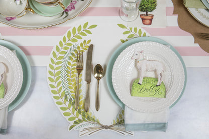 The Die-cut Seedling Wreath Placemat under an elegant springtime place setting, from above.