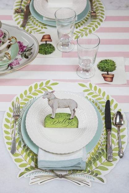 The Die-cut Seedling Wreath Placemat under an elegant springtime table setting.