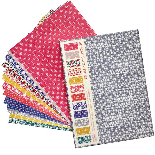 A collection of colorful patterned Special Starry Papers from Cambridge Imprint fanned out on a white background.