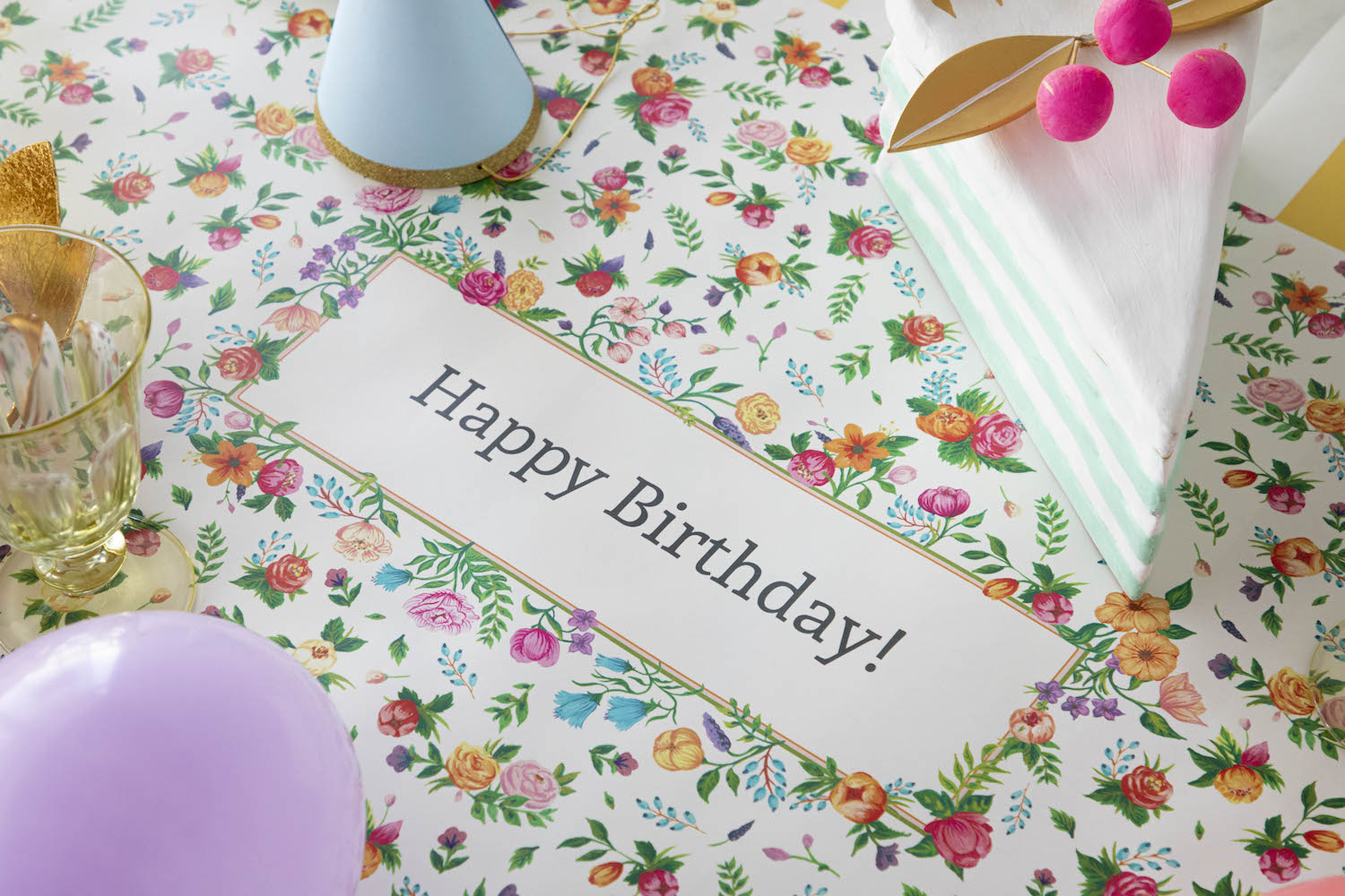 The Sweet Garden Personalized Runner under an elegant Birthday tablescape, with "Happy Birthday!" printed in the middle.