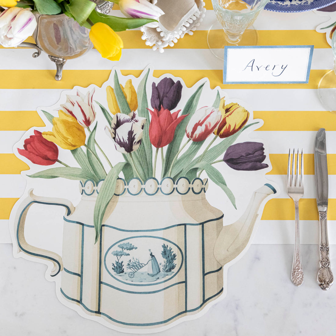 The Die-cut Tulip Teapot Placemat on an elegant springtime place setting sans plate, showing the full design.