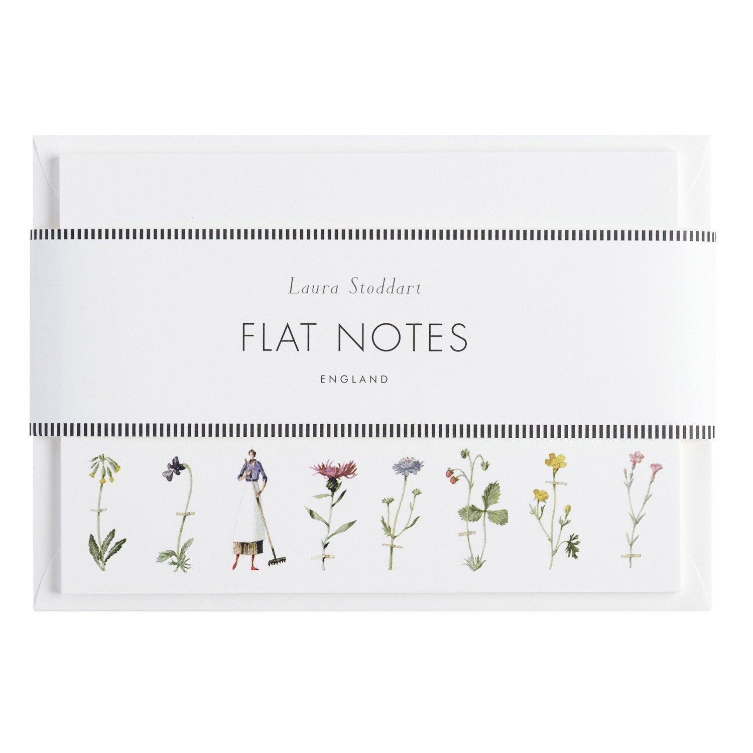The Laura Stoddart Flat Notes in retail packaging, showing the illustrations across the front with envelopes tucked behind, all wrapped in a white paper belly band.