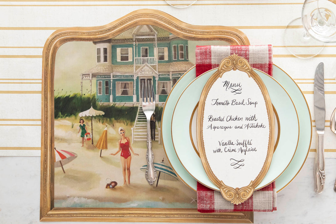 The Die-cut Beach House Placemat under an elegant place setting, from above.