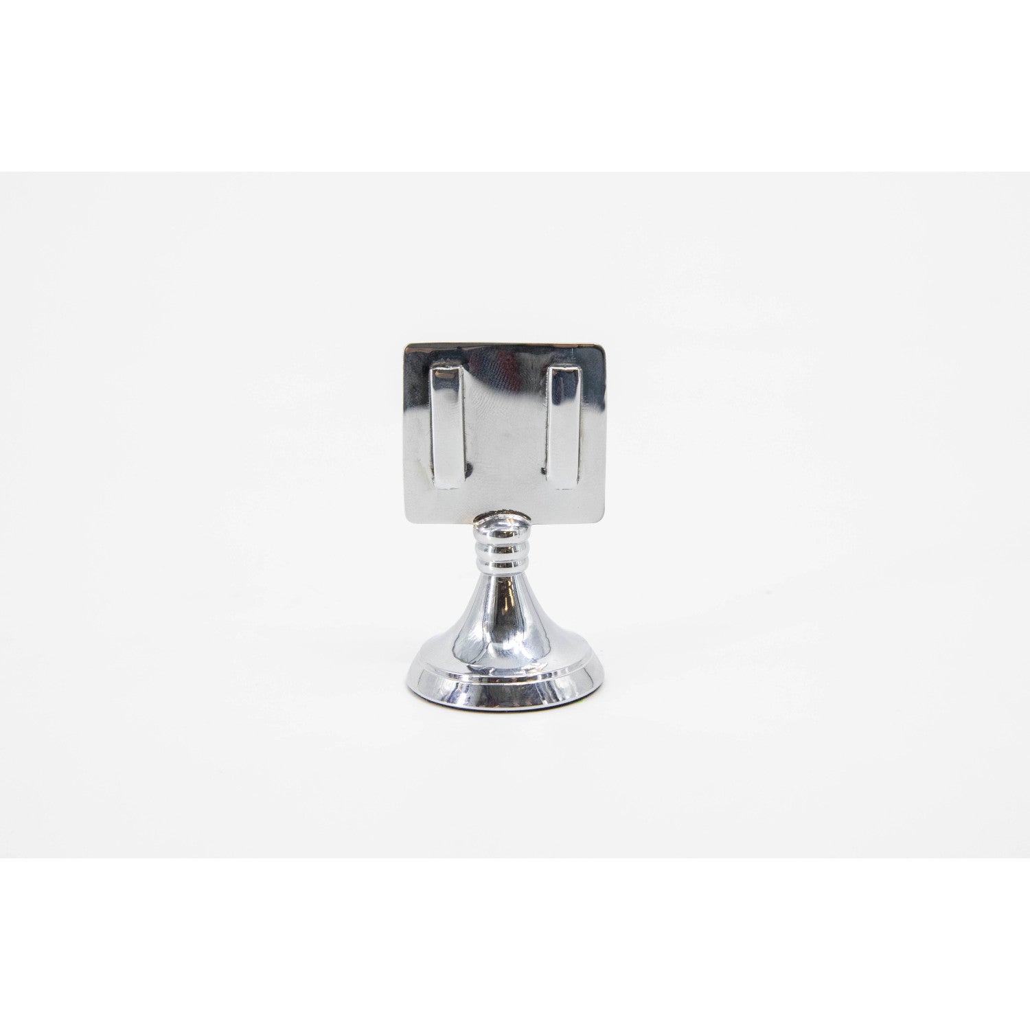 An elegant, chrome, short round stand topped by a flat card-holder with two flat prongs.