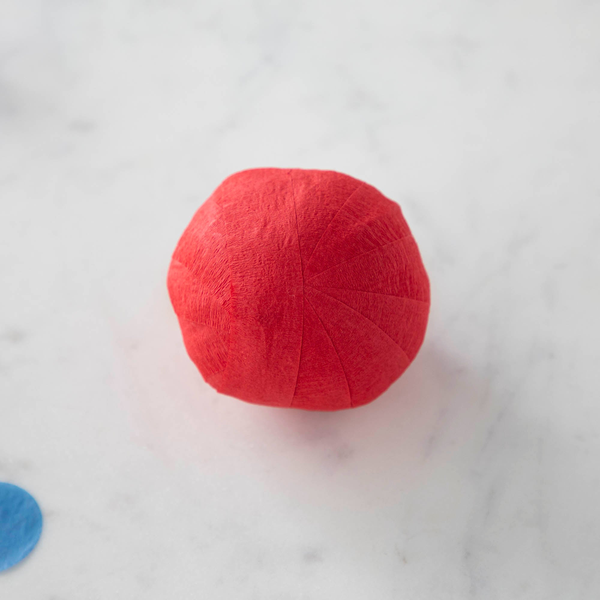 Vintage-inspired Mini Surprize Balls in a white bowl with confetti by Tops Malibu.