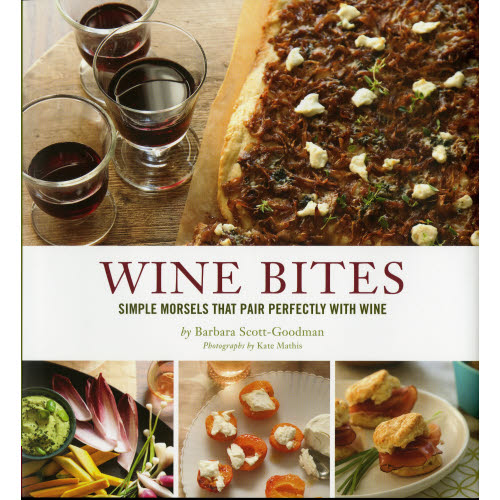 A cookbook cover titled &quot;Wine Bites&quot; by Chronicle Books featuring an image of a caramelized onion tart and glasses of red wine, with additional photos of appetizers including a cheese plate.