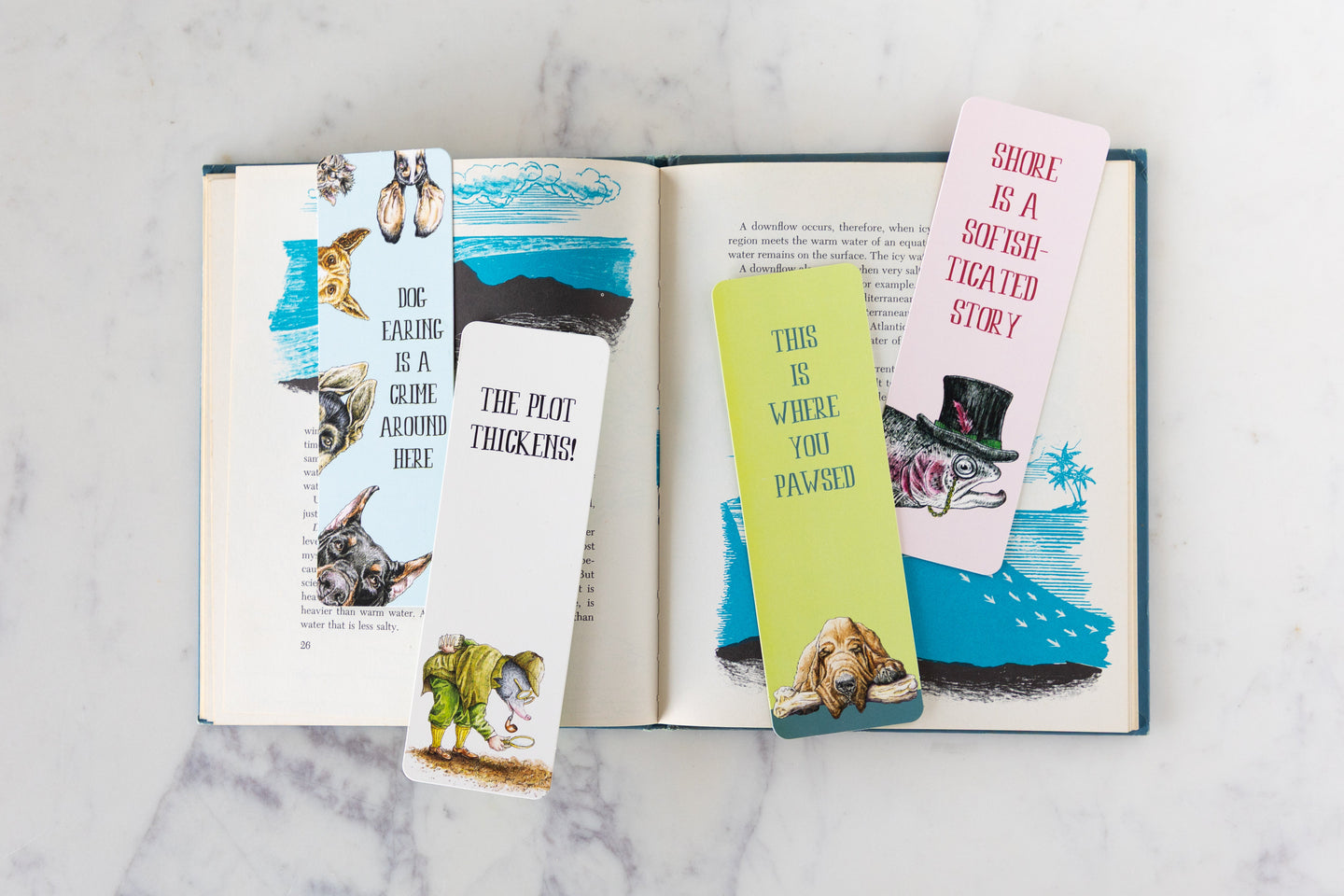 An open book featuring Bewilderbeest Bookmarks in the middle.