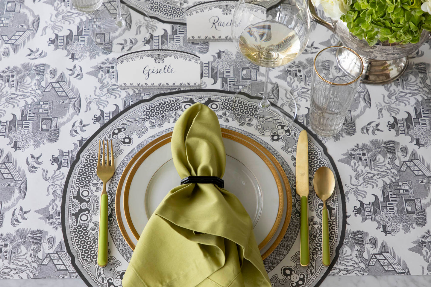 An elegantly styled table setting featuring the Burleigh Black Willow Story products.