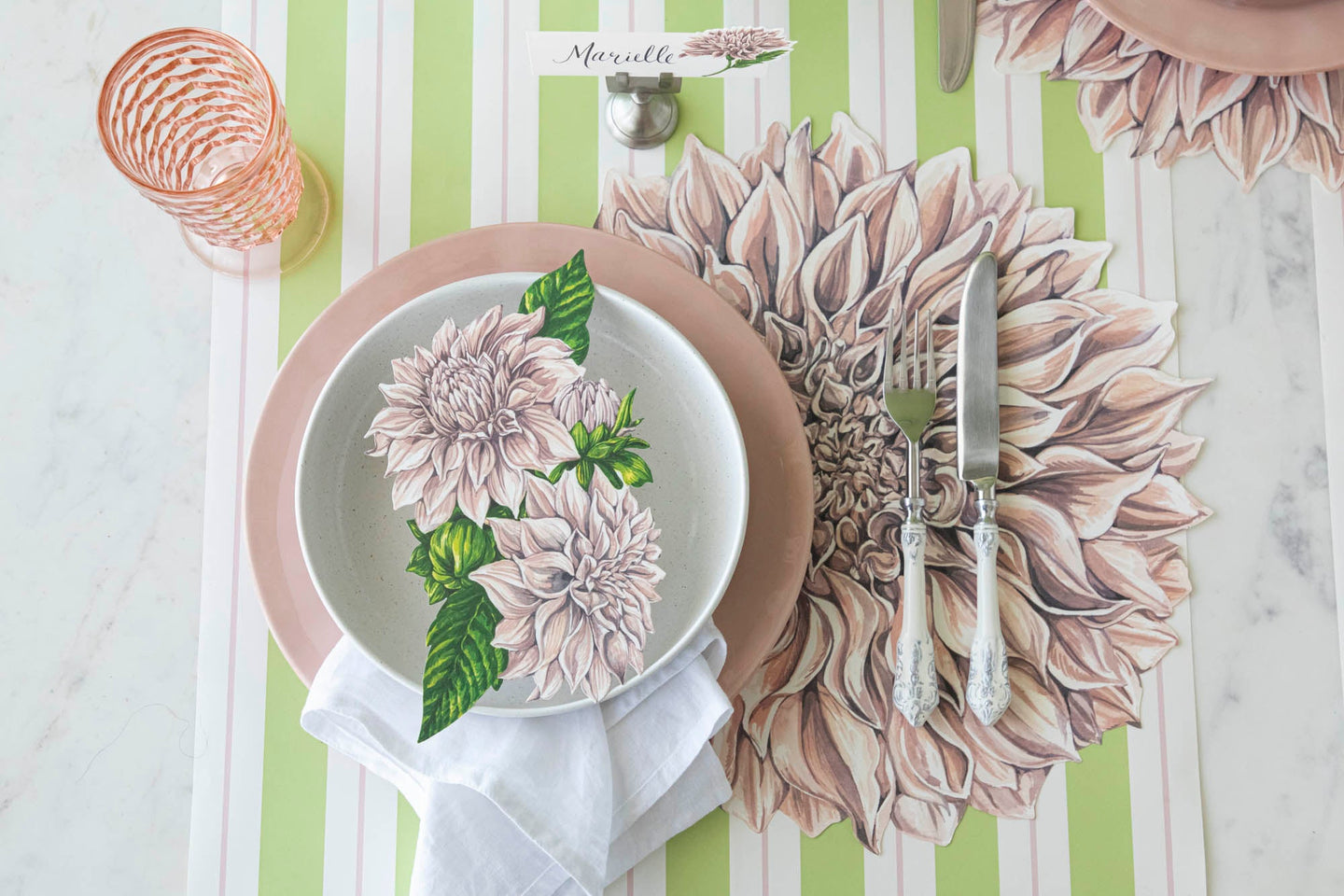 Dahlia Story products styled elegantly on a place setting for one.