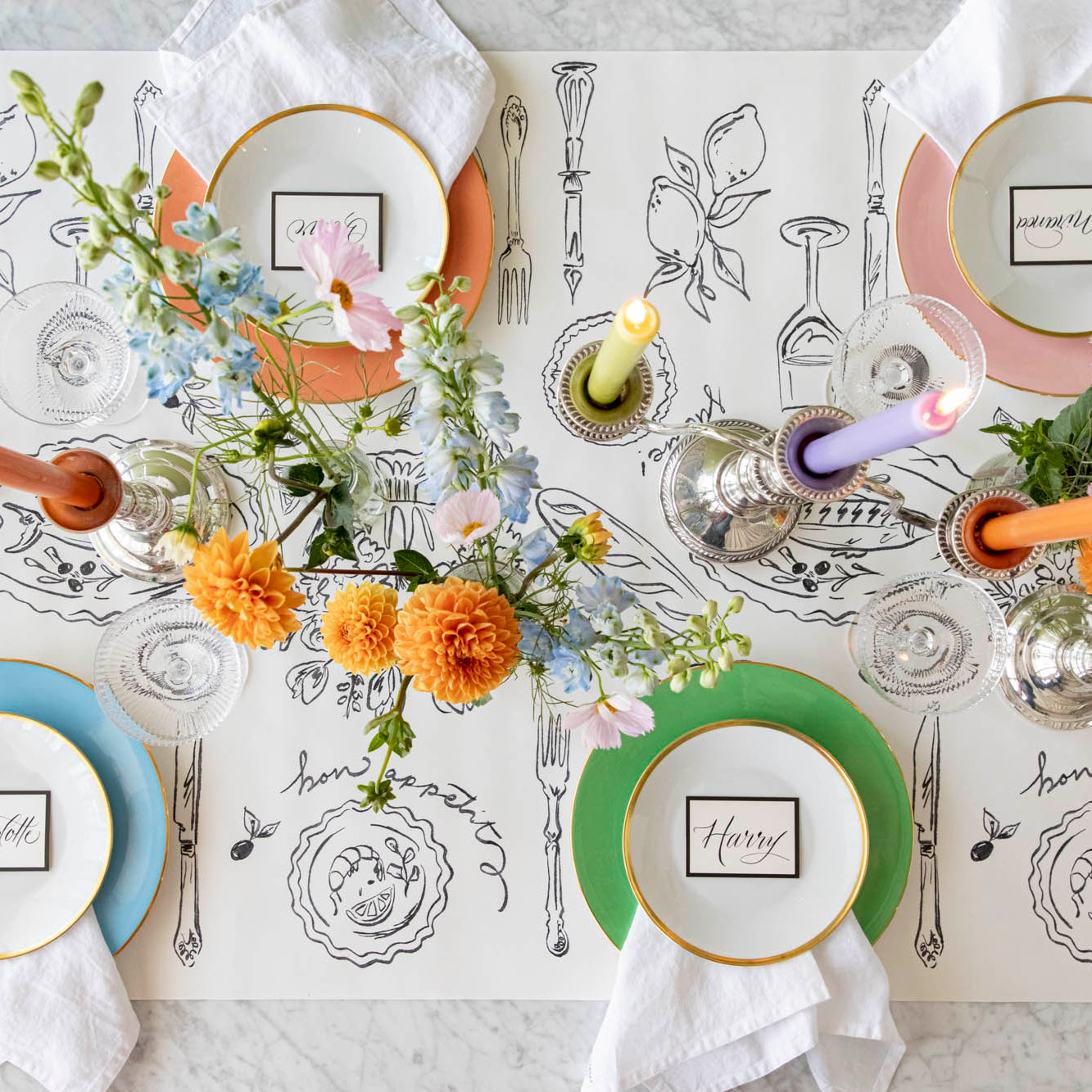 An elegant place setting with the Dinner Party Runner under a colorful plate.