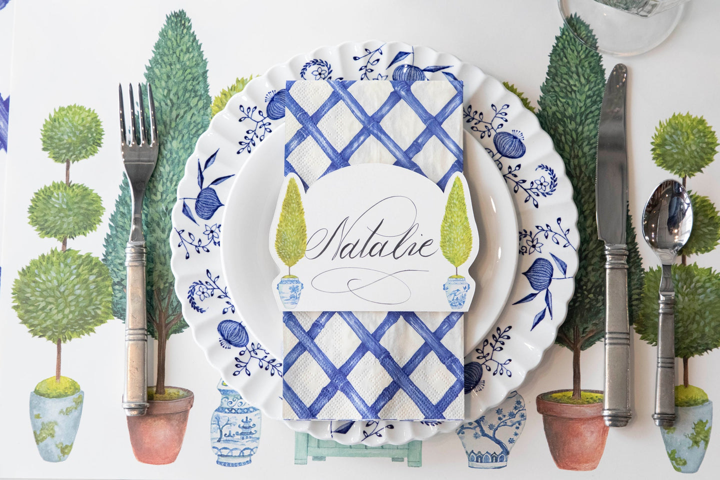Topiary Garden Placemat under a place setting for one.