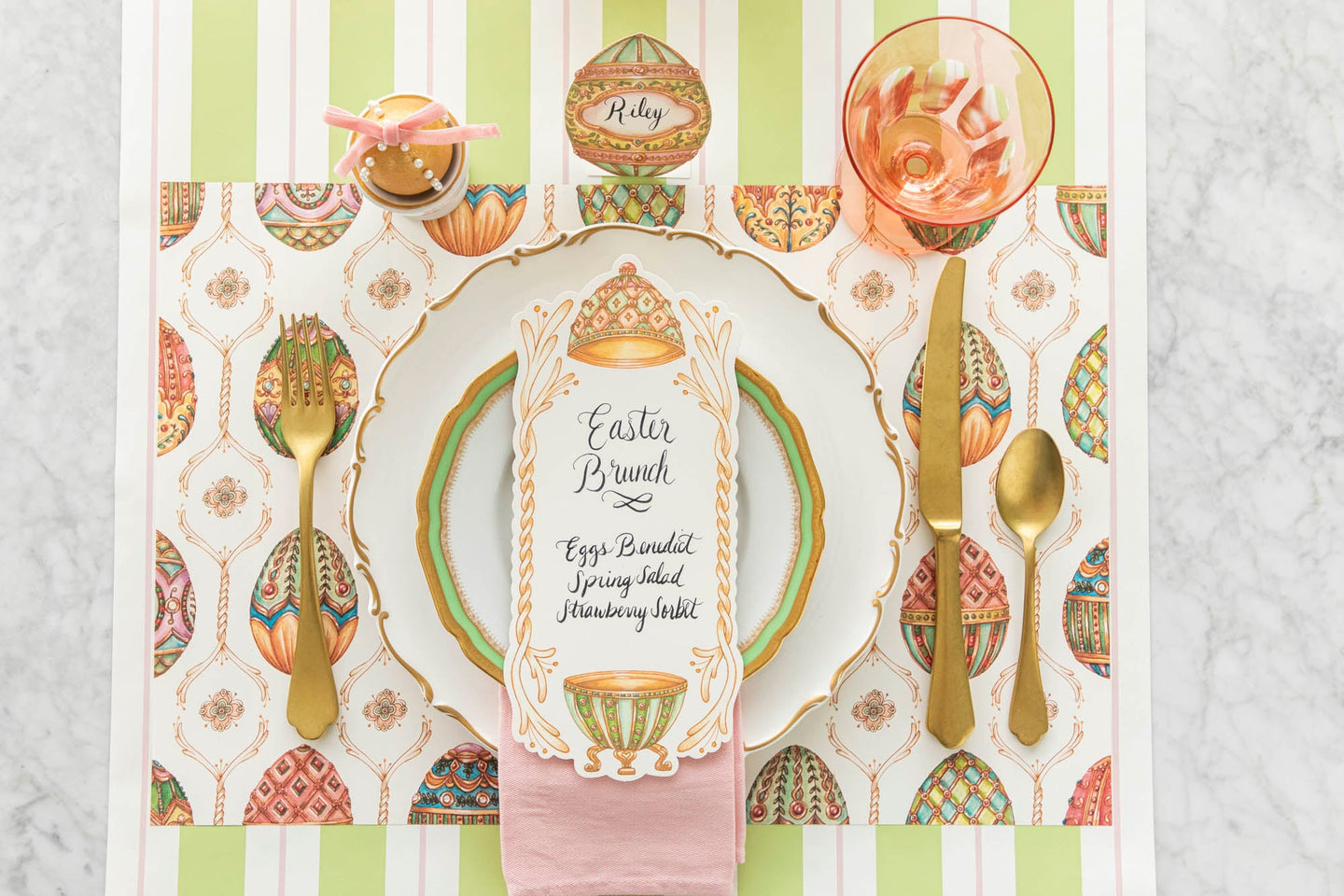 Exquisite Eggs Story items styled on a spring table.