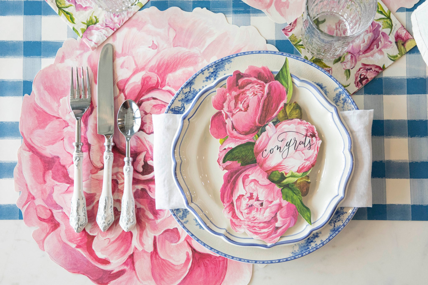 Peony Story on an elegant place setting for one.