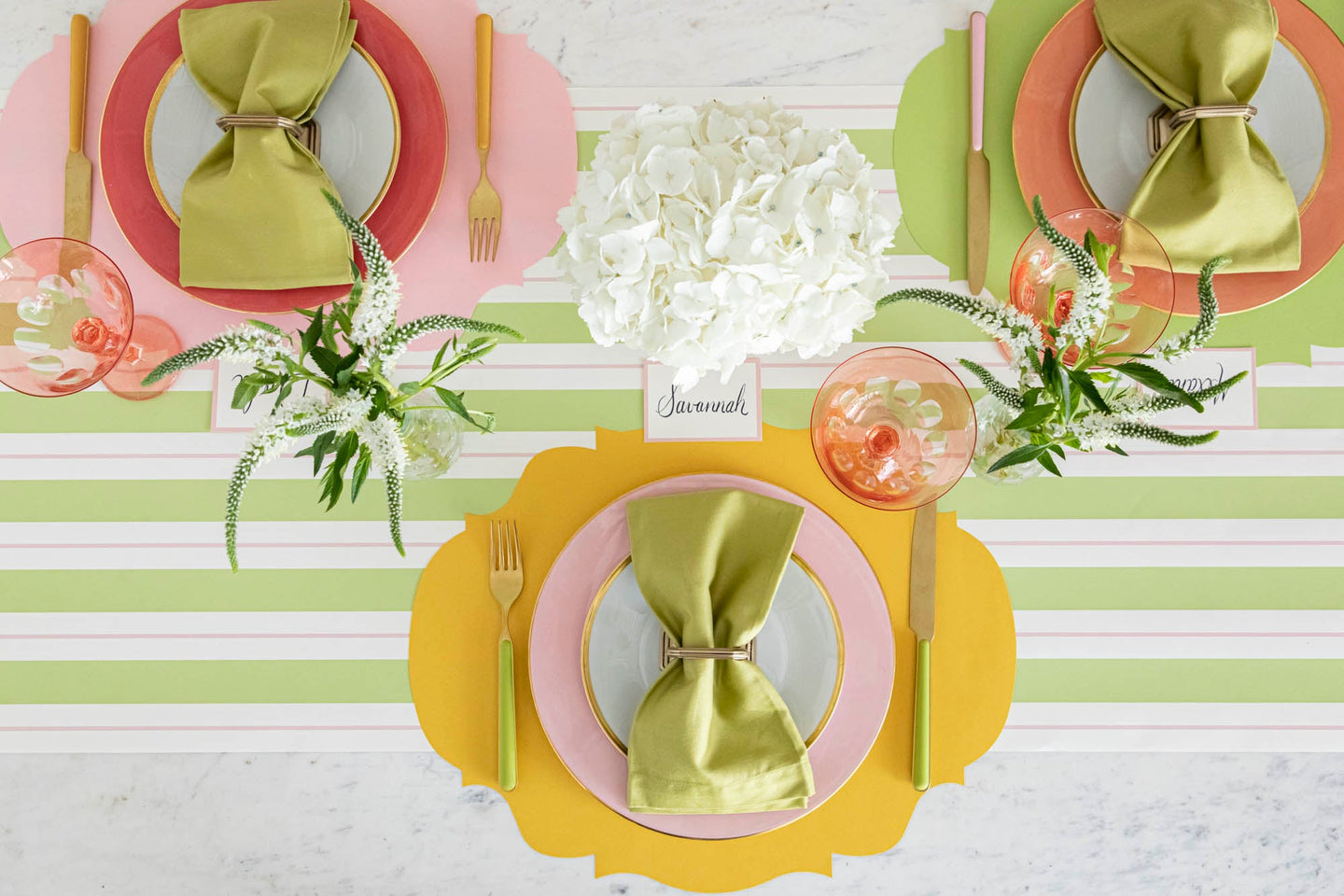 Marigold, Pink and Bright Green French Frame Placemats styled on a spring table setting.