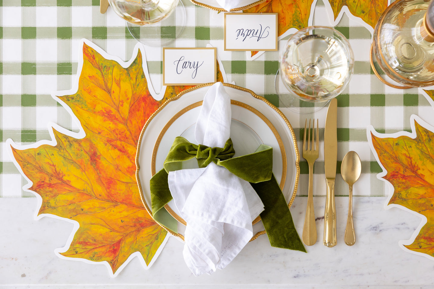 An elegant place setting featuring Vicki Sawyer's Die-cut Songbird Wreath Placemat and Hummingbird Table Accent.