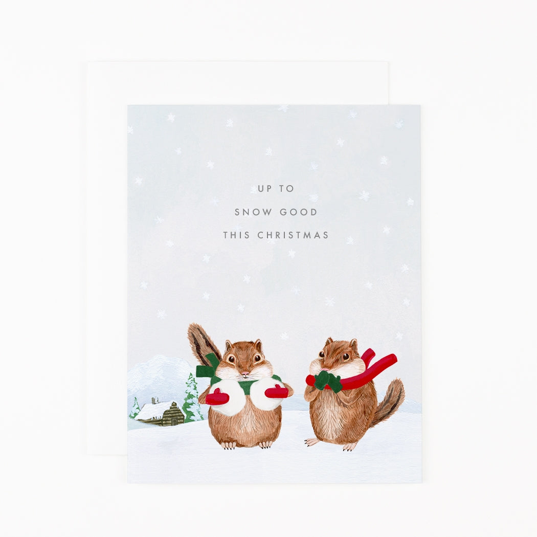 Christmas card with two squirrels wearing scarves and text &