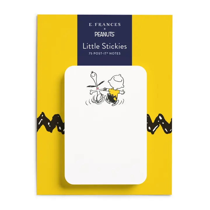 E. Frances Peanuts Little Stickies 75 post-it notes on a yellow backing card with black zigzag line art and a navy header.