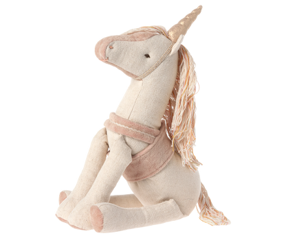 stuffed unicorn seated