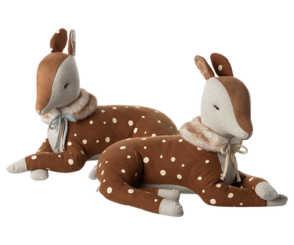 2 brown stuffed animal deer.  Both with faux fur scarves.  One deers scarf is tied with and off white ribbon the other with a blue ribbon