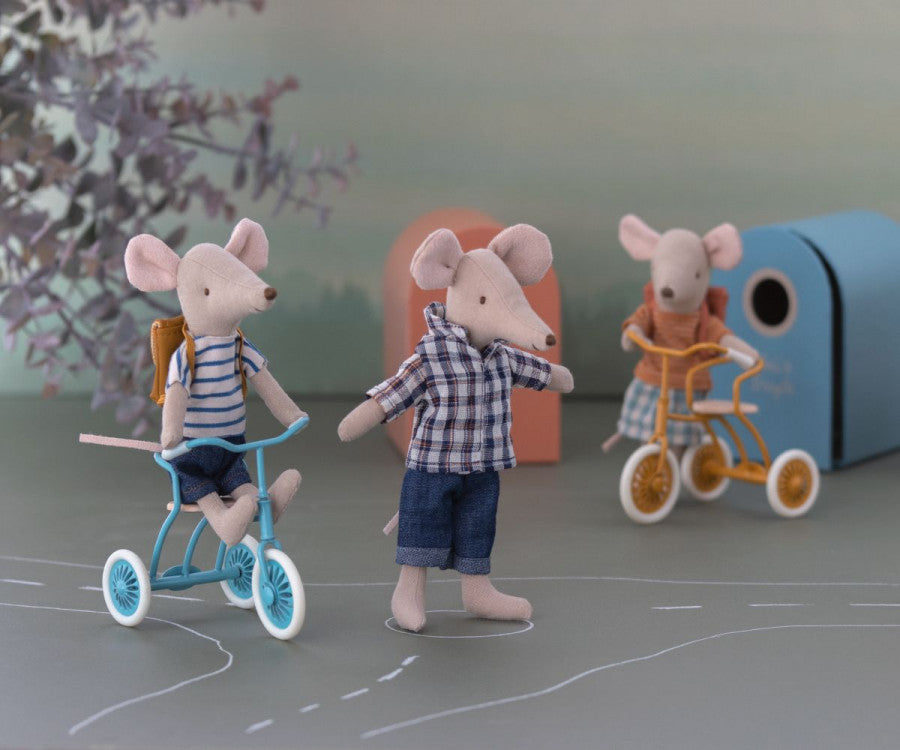 A Maileg Tricycle Mouse, Big Brother with Bag wearing a striped shirt and carrying a school backpack.