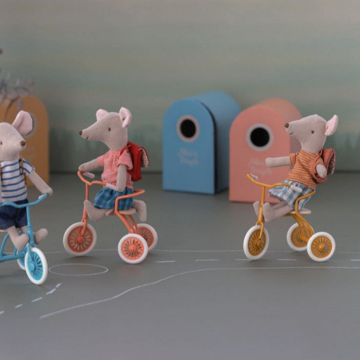 A Tricycle Mouse, Big Sister with Bag wearing a kindergarten dress by Maileg.