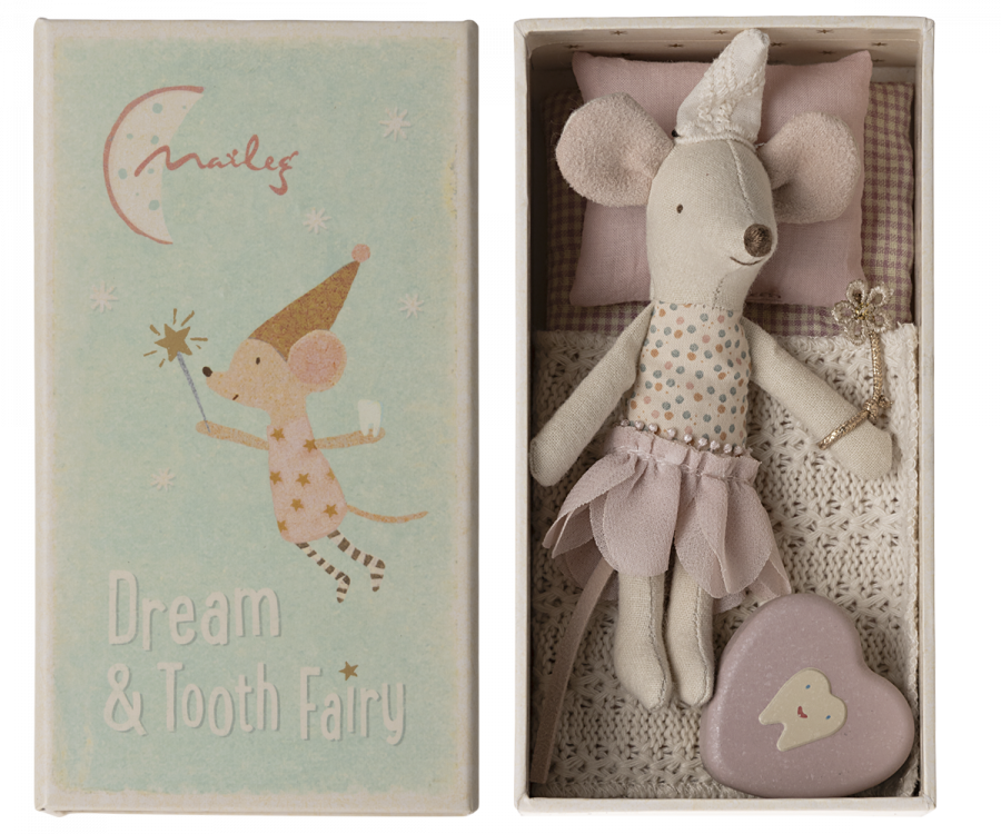 A toy mouse in a pink nightgown sitting inside a box with a lid that features a drawing of another toy mouse wearing a crown and the text &