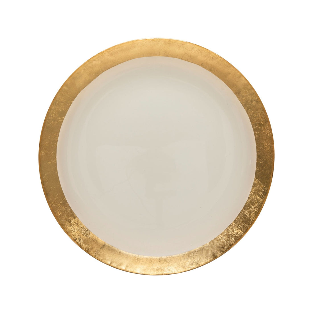 Round white plate with a gold rim on a white background