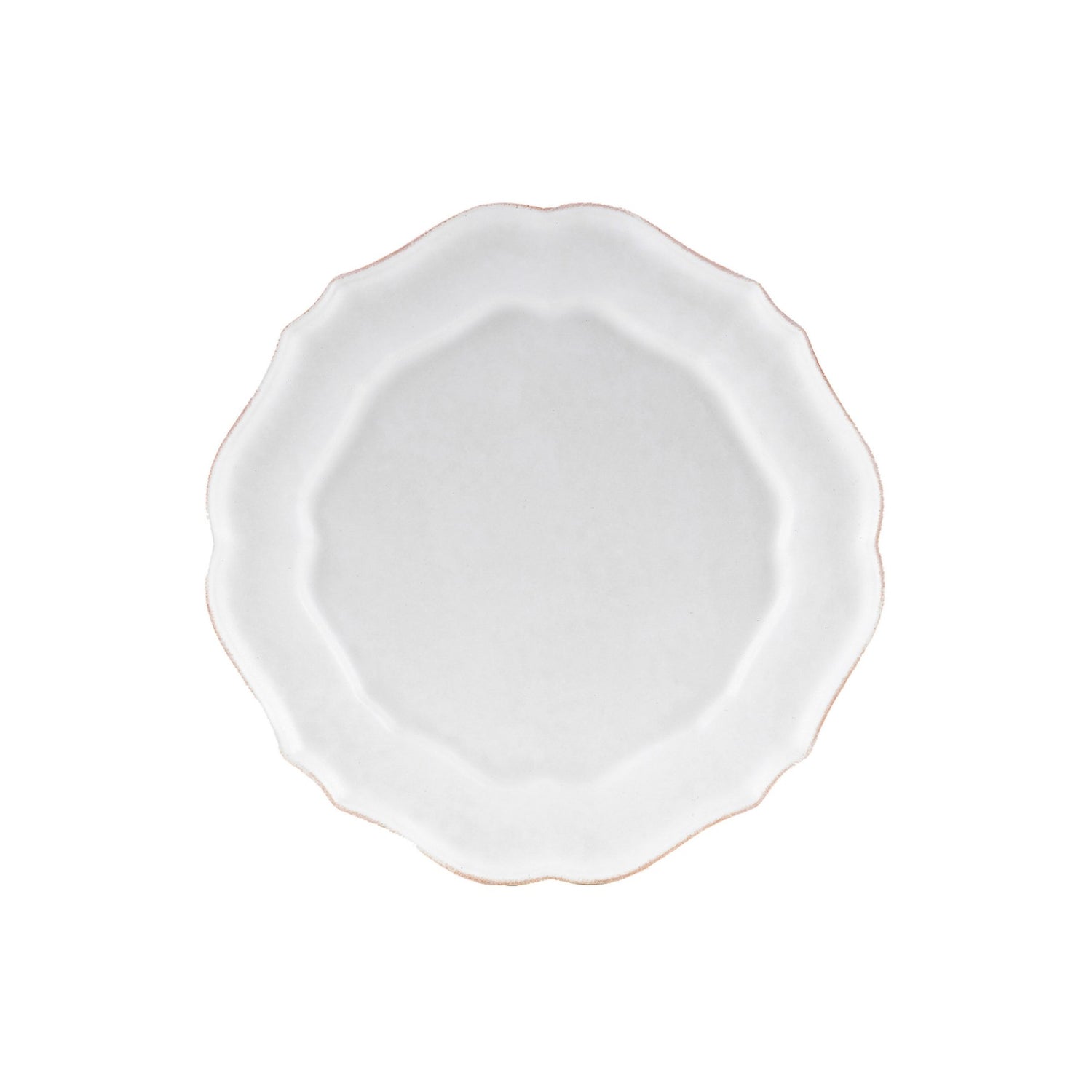 White ceramic plate with scalloped edge on a white background.