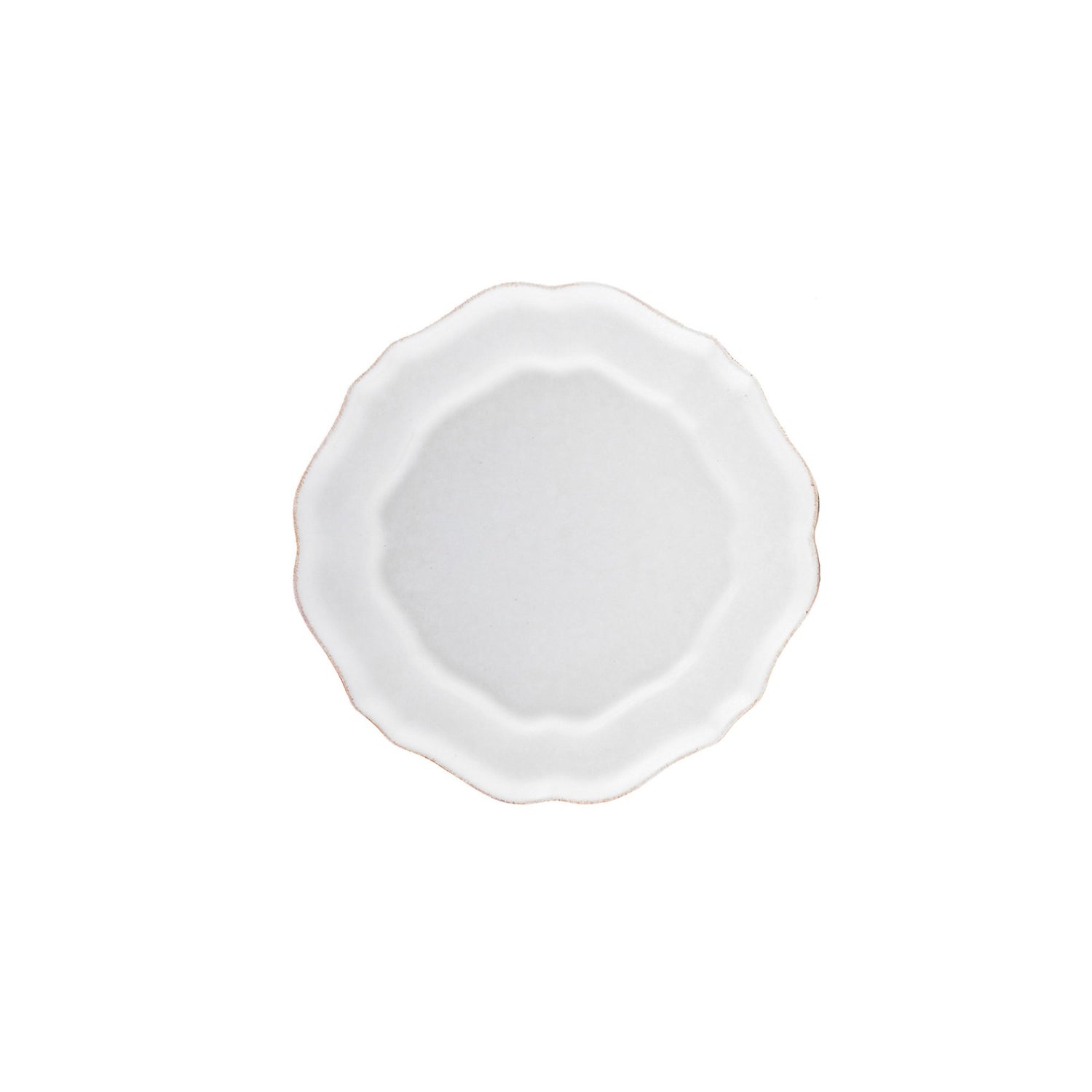 White ceramic plate with scalloped edge on a white background.