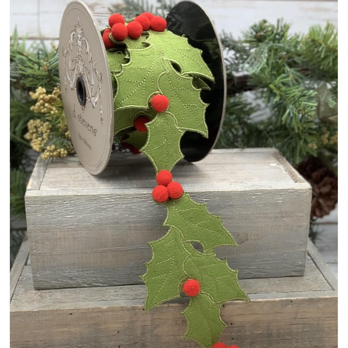 Green felt ribbon cut in the shapes of holly with red balls for berries. 