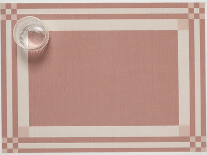 Handkerchief Compact Rectangle Placemat in Burnt Coral color with a glass in the corner