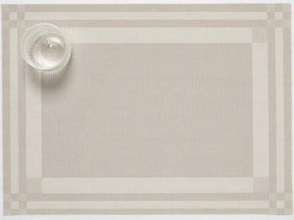 Flax color Handkerchief Compact Rectangle Placemat with a glass in the corner. 