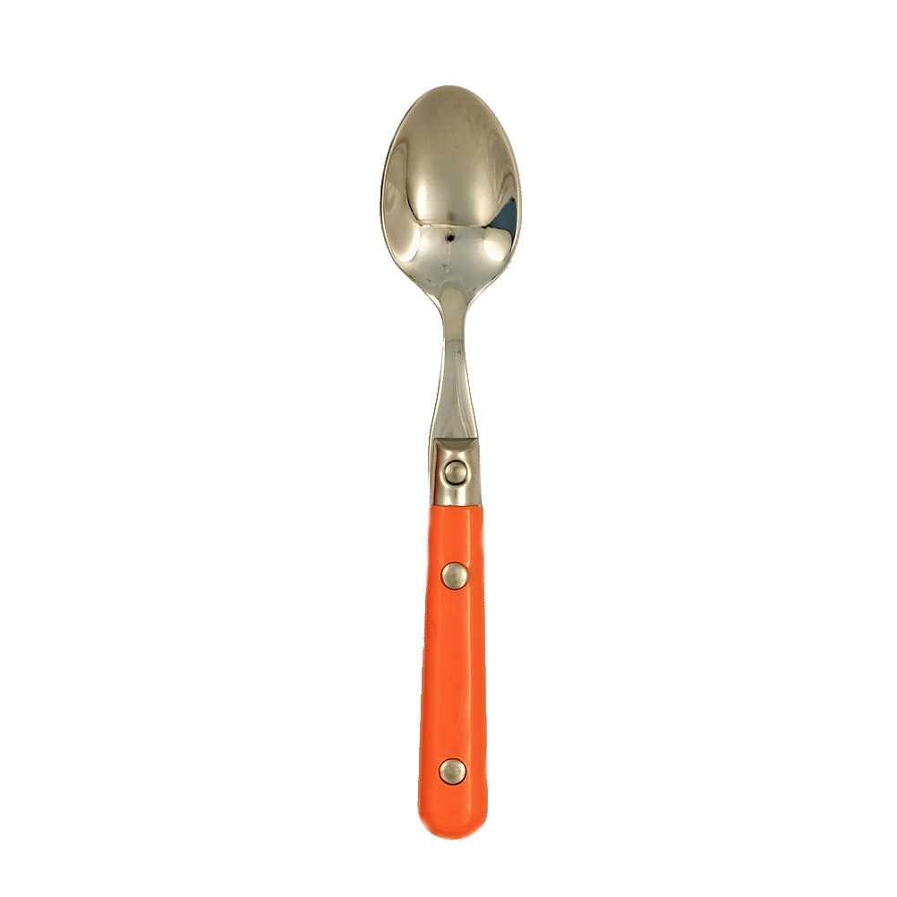 Spoon with an orange handle on a white background.