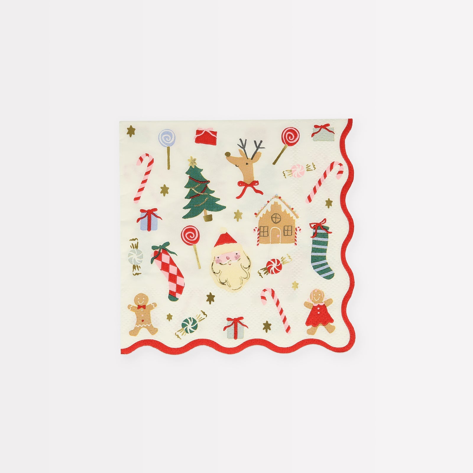 Meri Meri Jolly Christmas Small Napkins featuring a red, scalloped edge and various Christmas icons, on a white background.