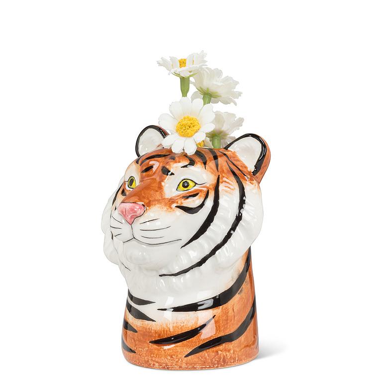 Tiger-shaped vase with flowers on a white background.
