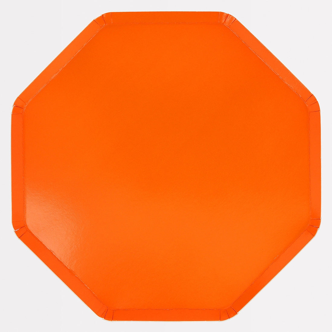 Orange octagonal paper plate on a white background.