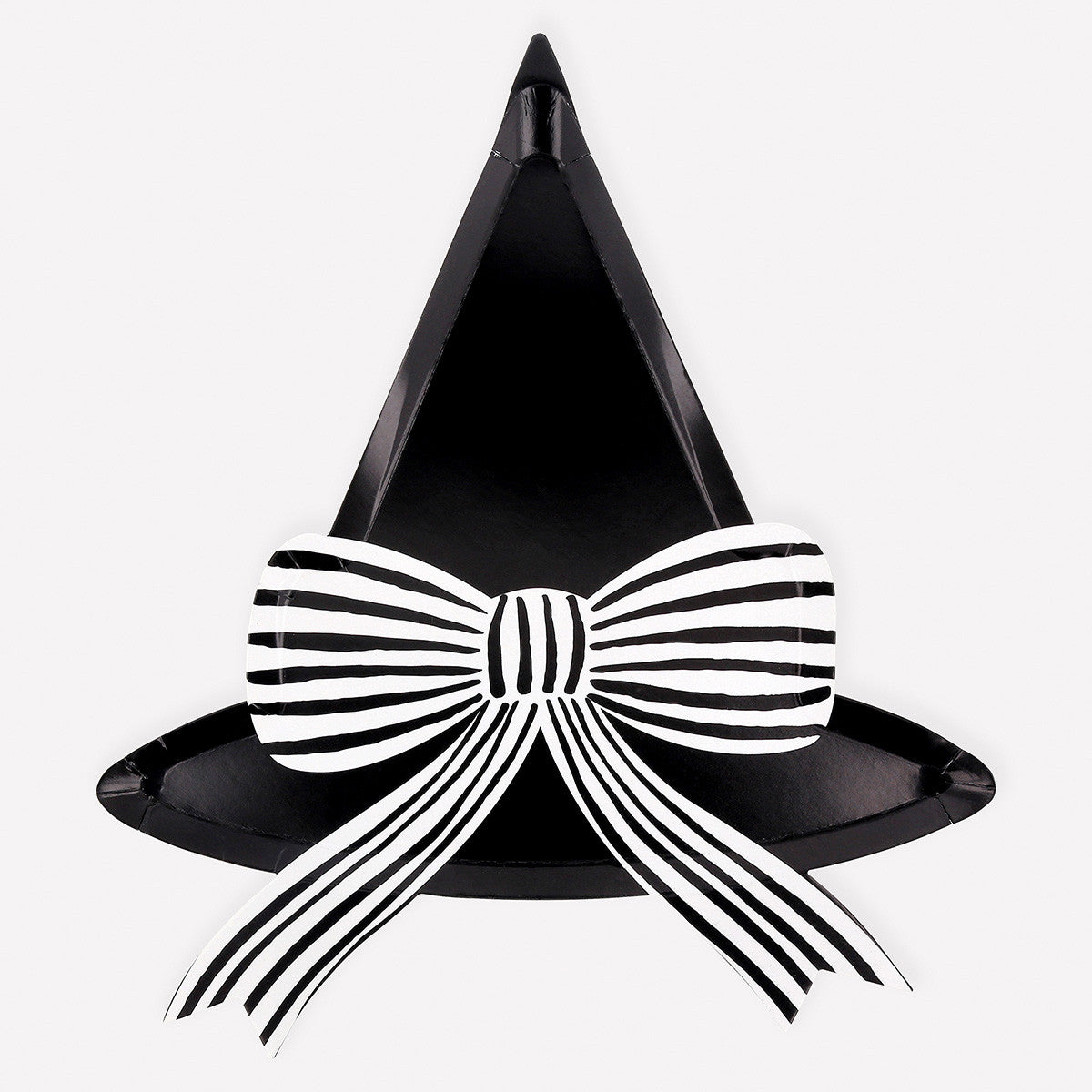 Black witch hat paper plate with a large white bow on a white background. 