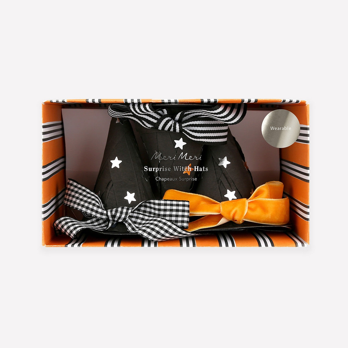 Set of witch hats with decorative bows in a box packaging