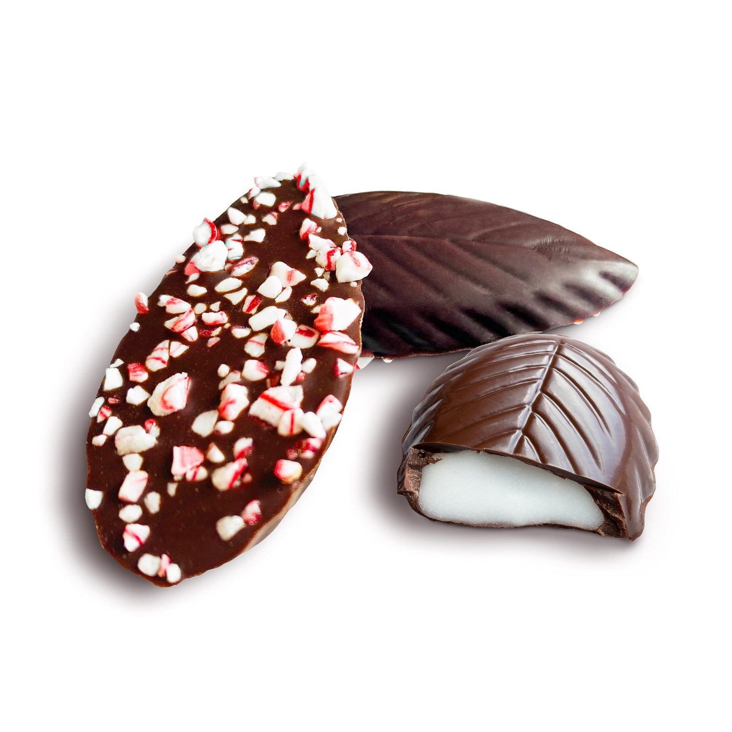 Three chocolate-covered treats with different toppings on a white background.