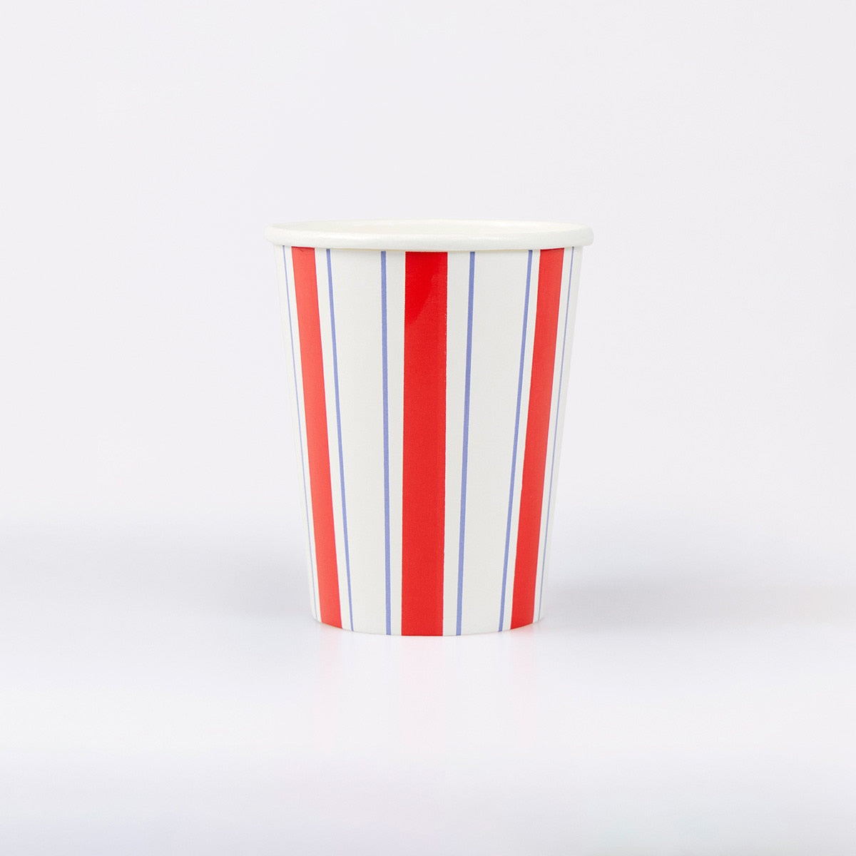 Paper cup with red and blue stripes on a white background.