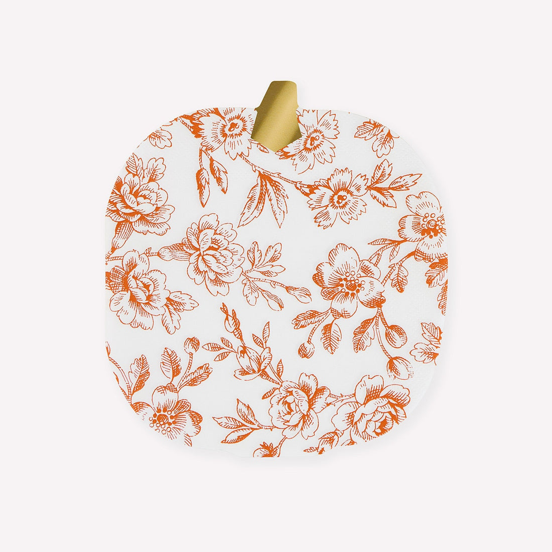 Pumpkin shaped white plate with orange floral pattern on a white background. 