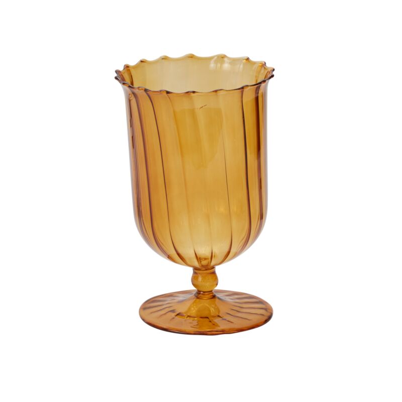 Amber glass vase with a fluted design on a white background